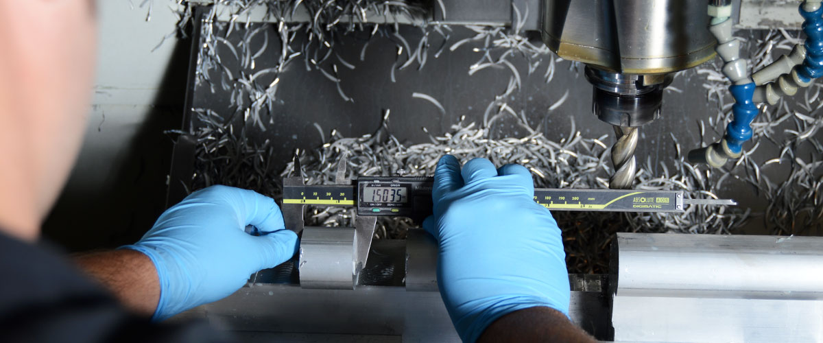 Precision manufacturing. Measuring milled part (precision manufacturing )